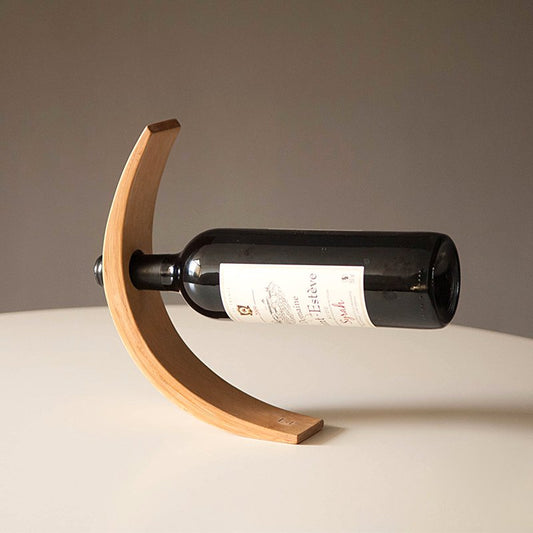 The Gravity Balance Bottle Stand