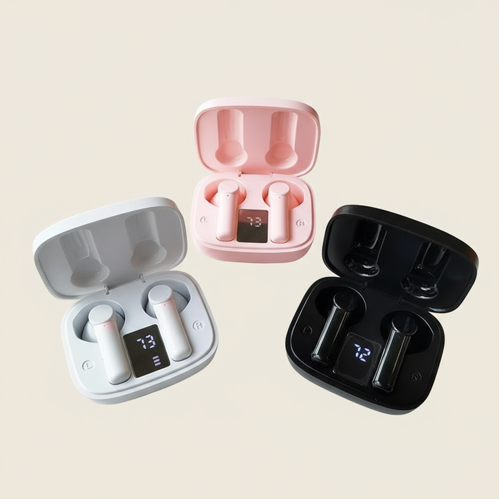 Three wireless earbuds in different colored charging cases on a white background