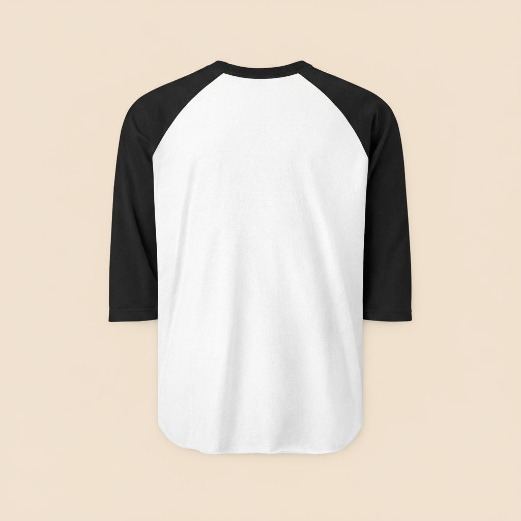 back of white baseball shirt with black sleeves on a tan background