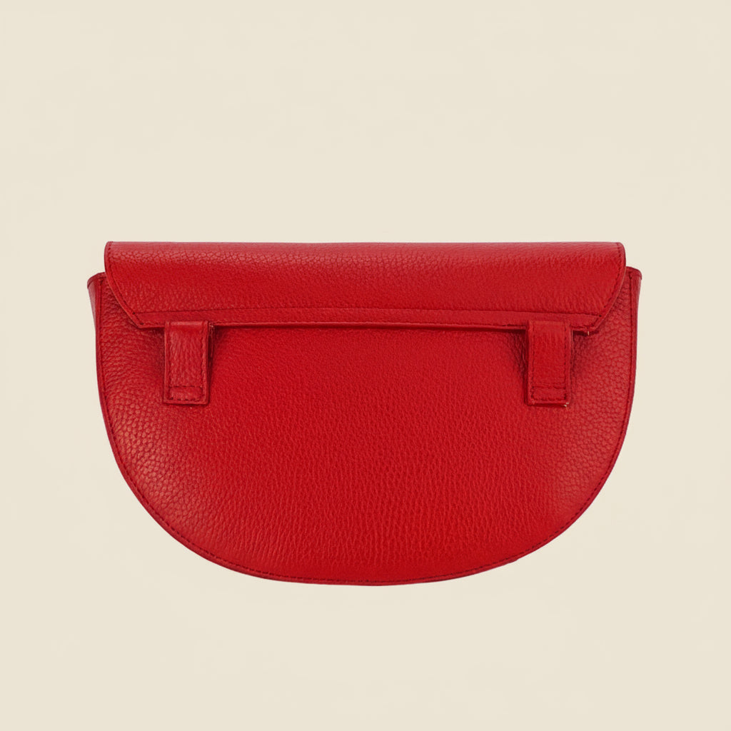 Red handbag on a beige background