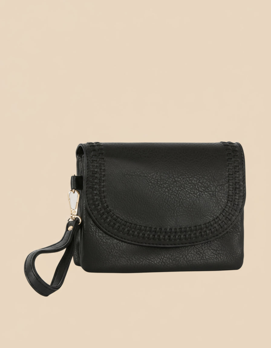 Black leather wallet with a strap on a tan background