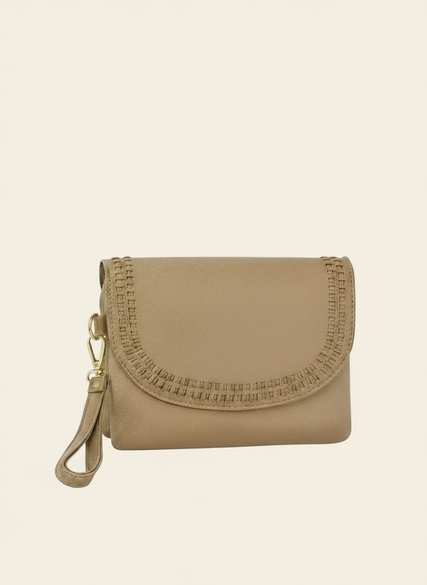 Beige clutch bag with a strap on a tan background