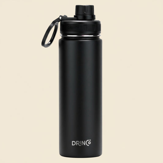 Black water bottle with DRINCO logo on a tan background