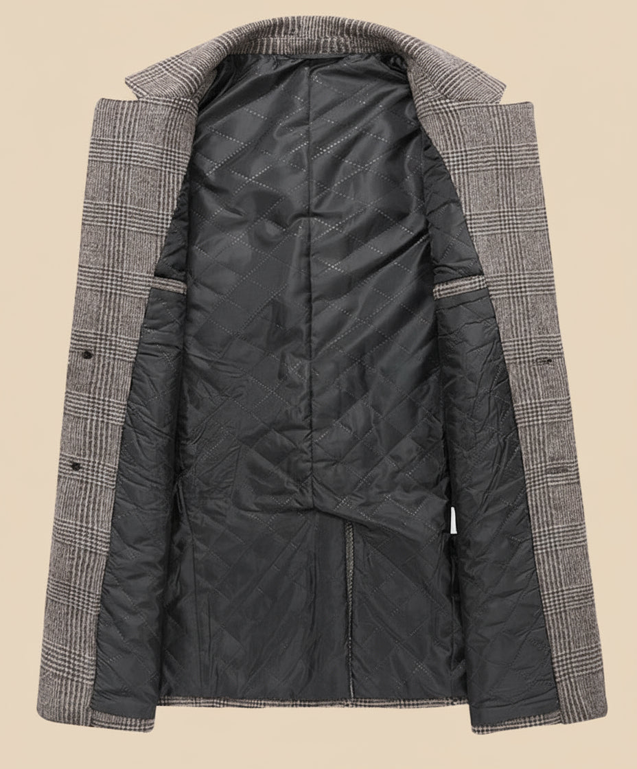 Gray checkered jacket with black quilted lining on a tan background