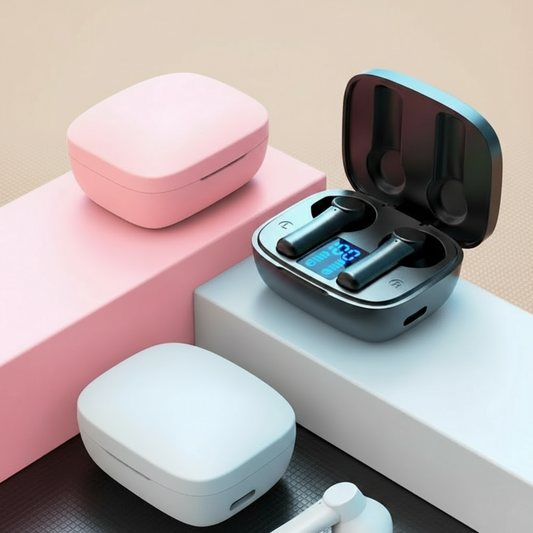 Wireless earbuds with charging cases on a light tan background