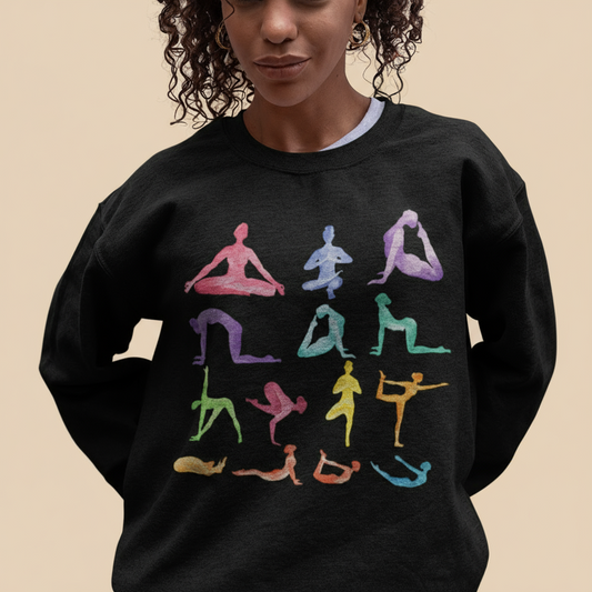 Person wearing a black sweatshirt with colorful yoga pose illustrations.