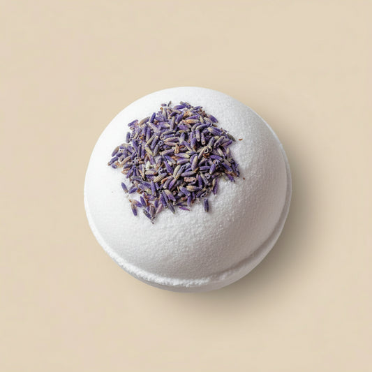Bath bomb with lavender on a stone surface