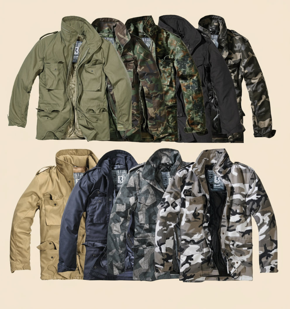 Collection of various camouflage jackets on a tan background